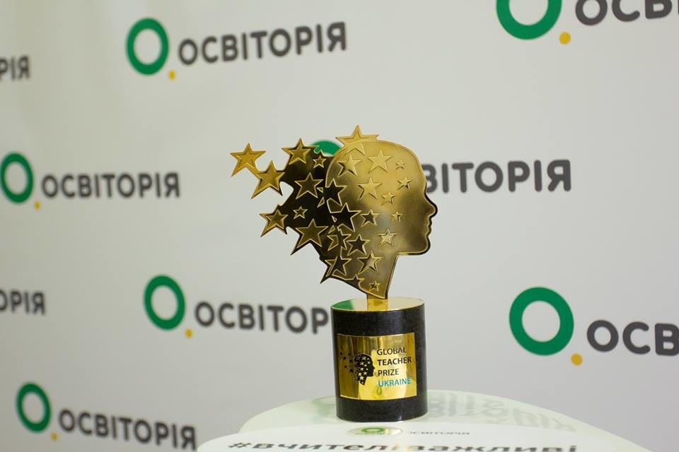 премія
