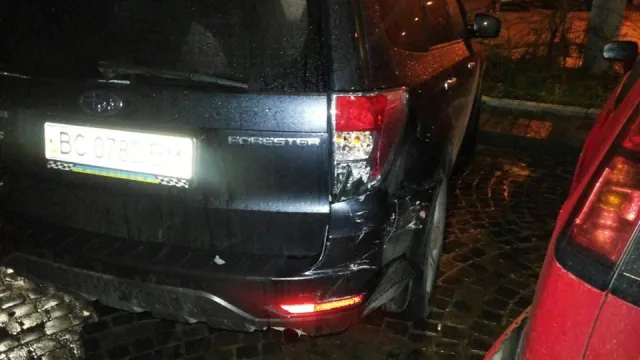У Львові автомобіль протаранив два легковики і зник з місця ДТП (Фоторепортаж) — фото 8