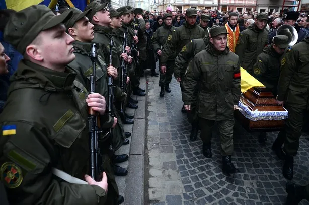 Львів попрощався із медиками, які загинули в зоні АТО (фоторепортаж) + (відео) — фото 4